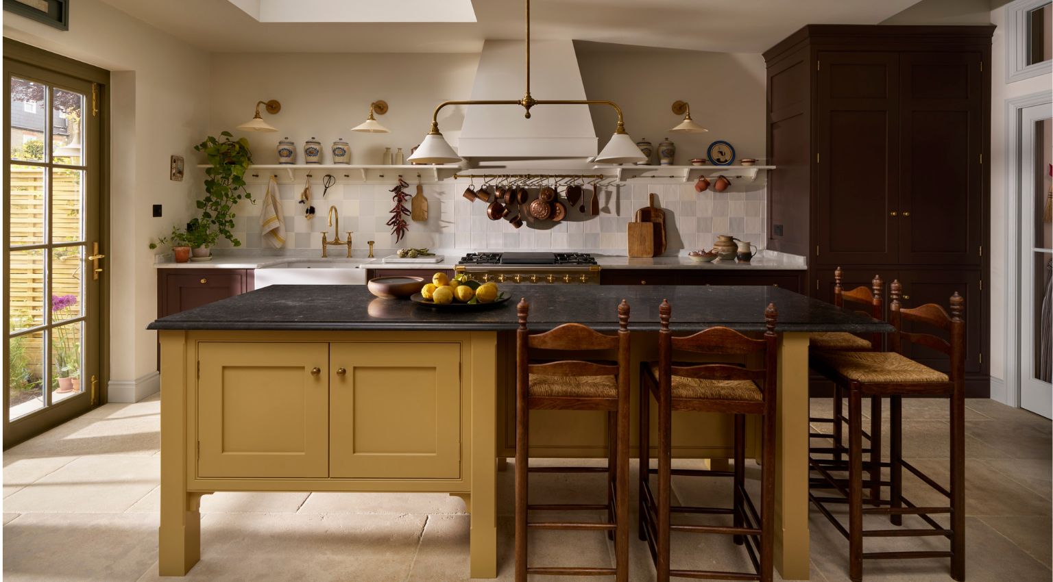 Limestone kitchen island with view to sink