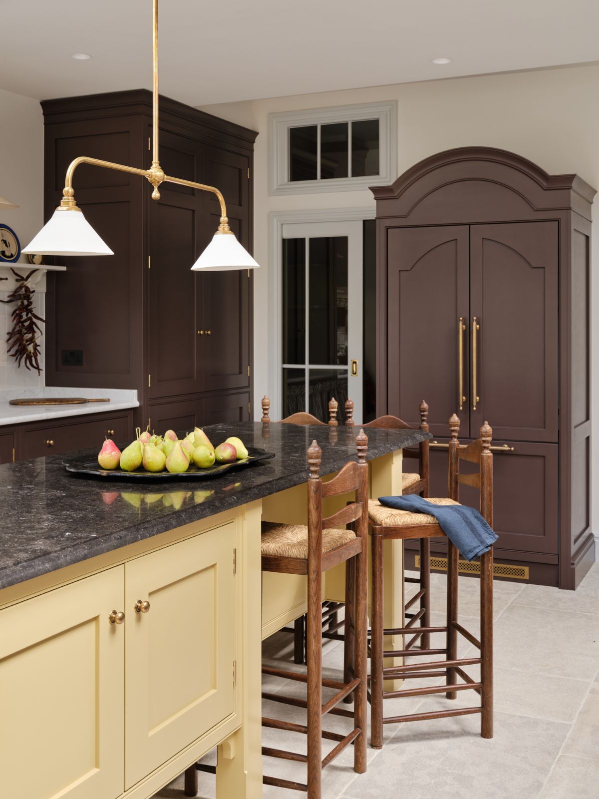 Freestanding arched pediment piece housing American fridge