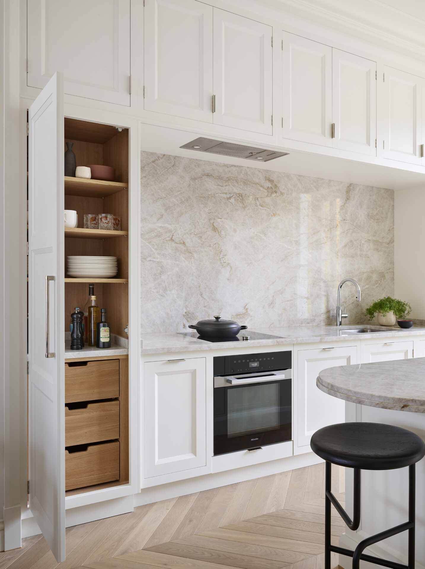 Bespoke cabinetry in a modern white kitchen