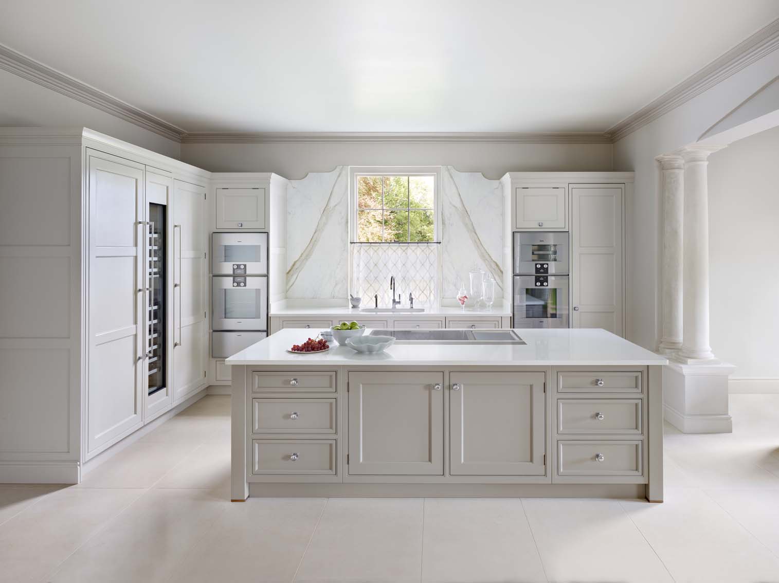 Grey and white contemporary kitchen with marble accents